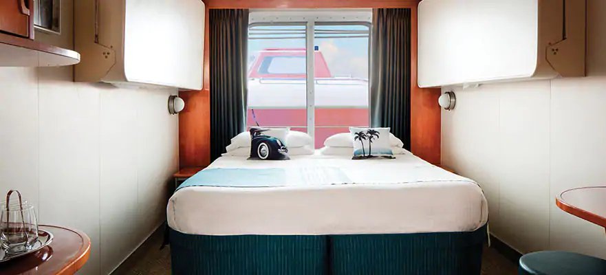 “Obstructed Oceanview Stateroom” cabin with a window