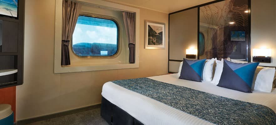 Каюта з вікном «Obstructed Oceanview Stateroom»