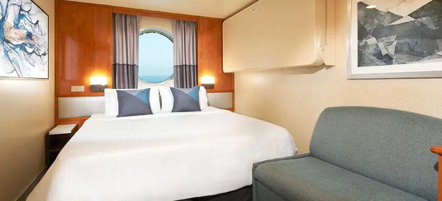 Каюта з вікном «Partially Obstructed Oceanview Porthole Stateroom»