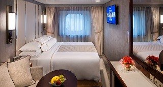 “Club Ocean View Stateroom” cabin with window